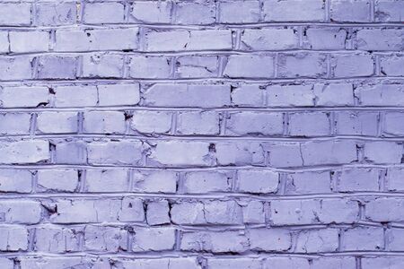 Brick wall painted in violet color, background