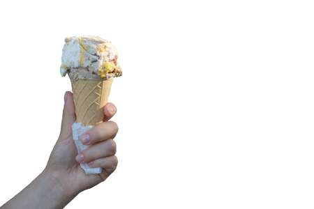 Ice cream cones in the hand isolated on a white backgroundの写真素材