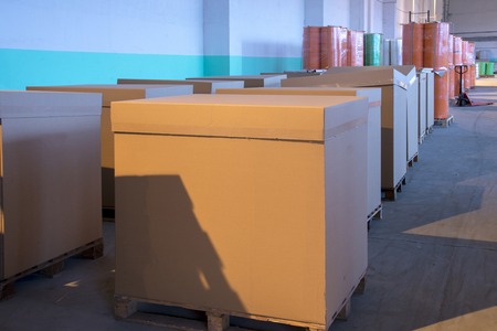 Photo of cardboard boxes, parcels in the warehouse