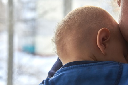Photo of children's nape with sparse white hair, close-upの写真素材