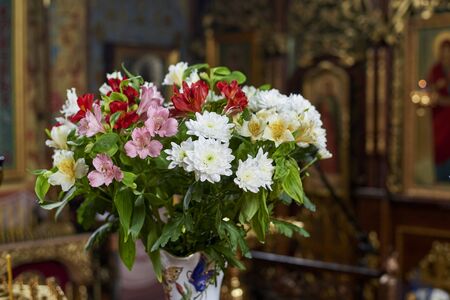 A magnificent bouquet of flowers in the Orthodox Church.の写真素材
