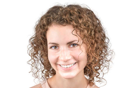 Portrait of a cute smiling woman isolated on a white background.の写真素材