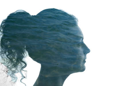 Silhouette of a woman's face filled with water, the concept of psychological stability.