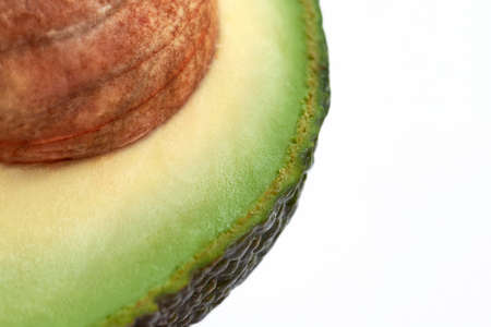 Ripe avocado fruit with seeds, macro photo, copy space.の写真素材
