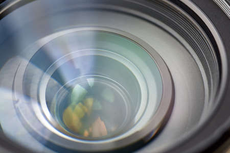 Camera lens with reflection, macro photo, close-up, backdrop.の写真素材