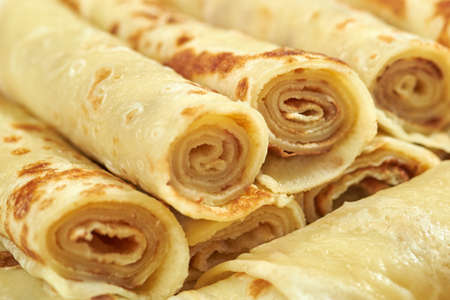 Group of fresh rolled fried pancakes, macro, close-up.の写真素材