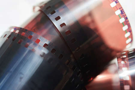 Film strips from retro camera, close-up, theme of past technology.の写真素材