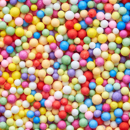 Small multicolored polyfoam balls, theme of holidays and birthdays, backdrop.の写真素材