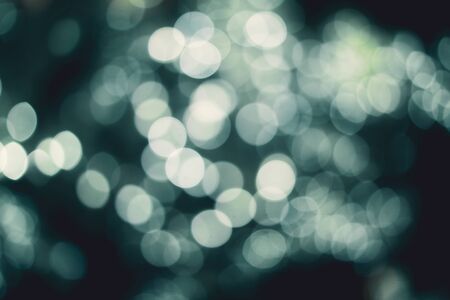 white color bokeh lens effect and black background