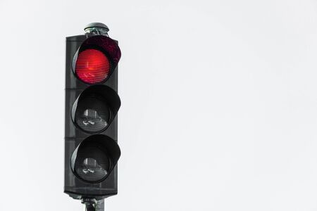 red traffic light on white backgroundの写真素材