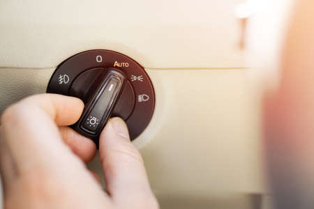 vehicle headlight on / off buttonの写真素材