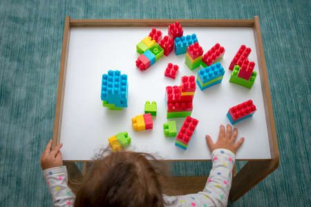 Top view of tiny model car speeding on black highway.の写真素材