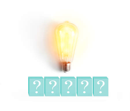 luminous bulb and question mark on white backgroundの写真素材