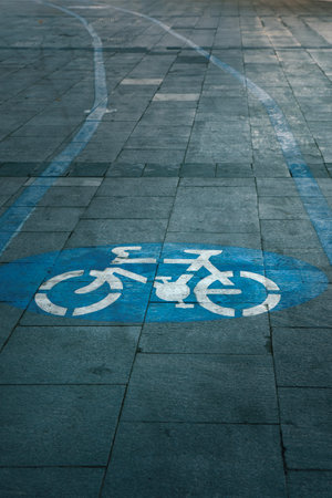 sign indicating bicycle path on the sidewalk
