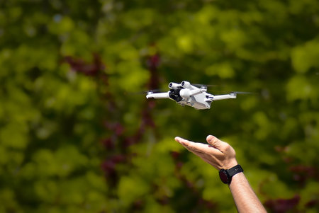 remote-controlled helicopter with four rotors and camera