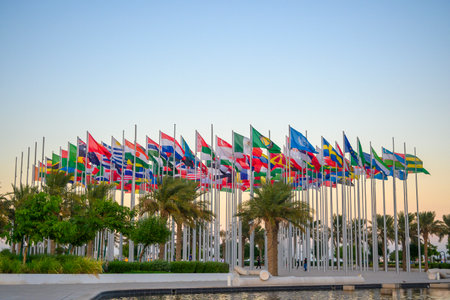Flagpoles of national flags near Doha old port, Qatarの写真素材