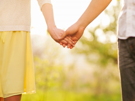 Close-up Holding Handsの写真素材