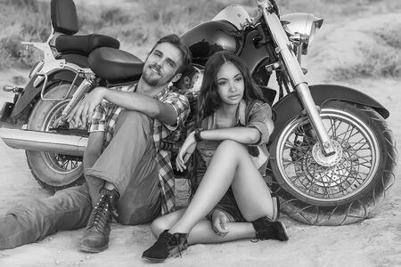 Biker man and girl vintageの写真素材