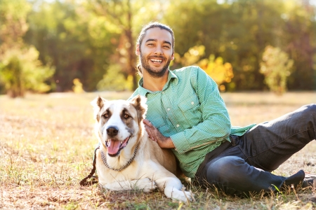 Man and central Asian shepherdの写真素材