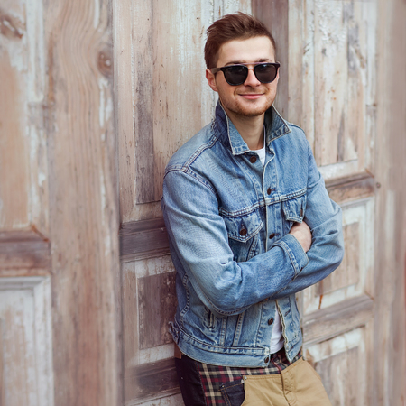 handsome guy with glasses and a fashionable hairdo  vintage photoの写真素材