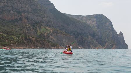Kayak  People kayaking in the oceanの写真素材
