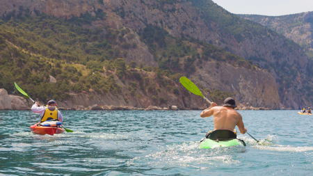 Kayak  People kayaking in the oceanの写真素材