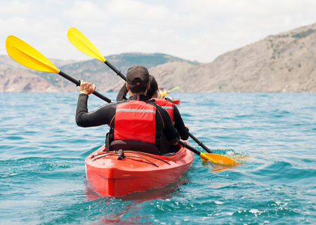Kayak  People kayaking in the oceanの写真素材
