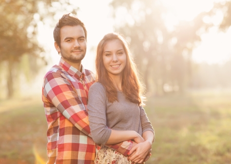 Young couple in love walking in the parkの写真素材