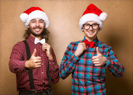 two guys on Christmas show sign of coolの写真素材
