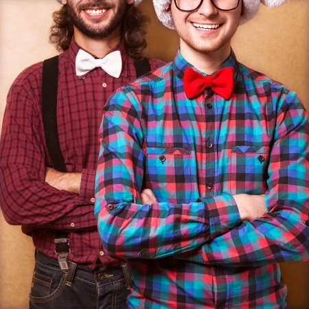 Two hipsters in stodio on christmasの写真素材