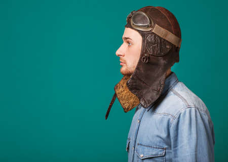 fashion vintage motorcyclist helmet and sunglasses in the studioの写真素材