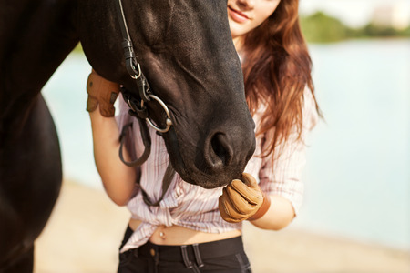 Beautiful woman and horseの写真素材