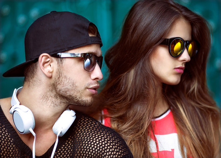 Sexy and fashionable couple in sunglasses. Vogueの写真素材