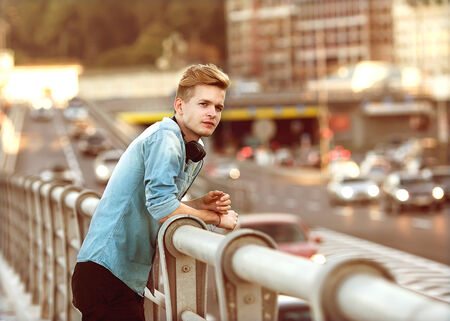 guy hioster listens to the player on the streetの写真素材