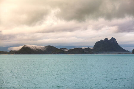 sunrise on the sea on the horizon visible islandsの写真素材
