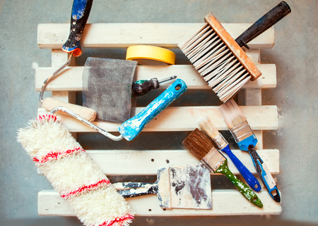 construction tools lie on the floor in the paint