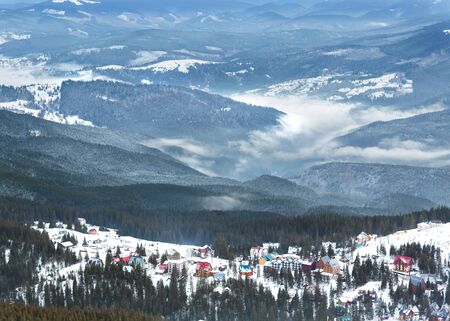 high mountain ski resort with beautiful colorful housesの写真素材