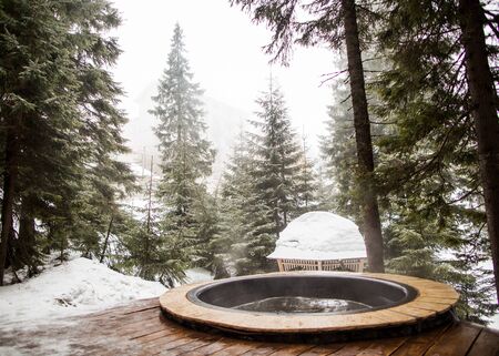 chan-pool with hot water in the snowy mountainsの写真素材