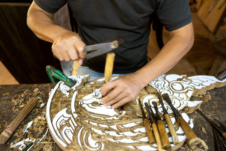 guy with wood tools are on the table near the productの写真素材