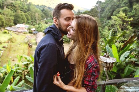 couple in love with the mountains in the tropicsの写真素材