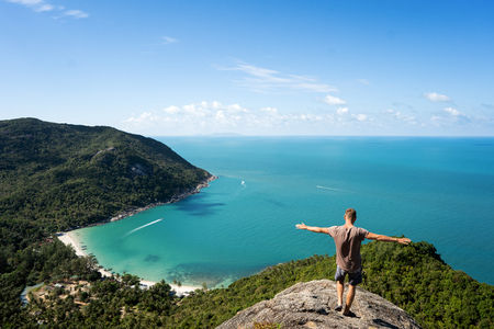 guy travels to mountains in Thailand, rear viewの写真素材