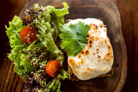 Lasagna top view with saladの写真素材