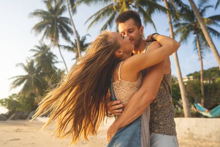 couple in love at sunset by the sea, valentines dayの写真素材