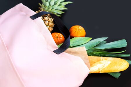 bag with products on the black background, delivery, takeawayの写真素材