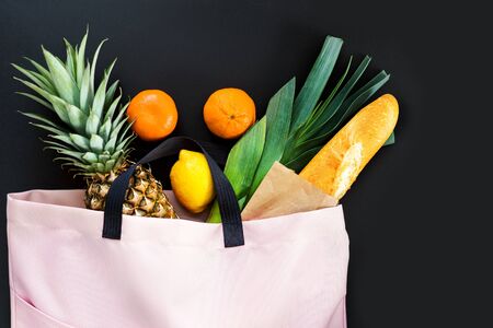 bag with products on the black background, delivery, takeawayの写真素材