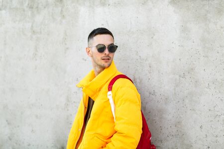 guy with a backpack of products, shopping online, takeaway foodの写真素材
