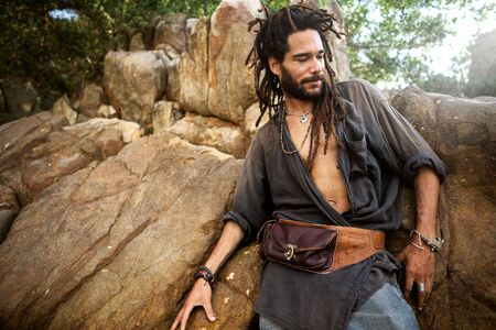 handsome guy with dreadlocks on an island in thailandの写真素材