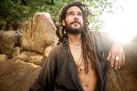 handsome guy with dreadlocks on an island in thailandの写真素材
