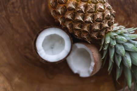 tropical fruits lie on a loft table on a white backgroundの写真素材