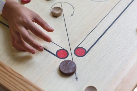 family plays a board game together quarantined funの写真素材